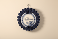 Navy Blue Welcome Wreath on soft cream background